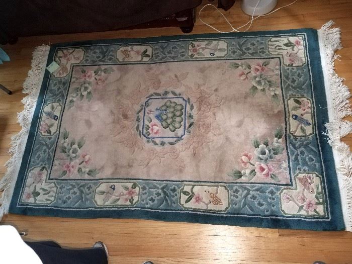 Approx 3x5 bird motif floor rug