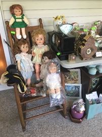 vintage rocking chair, clocks, dolls