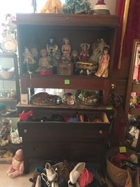 antique chest, antique display case, dolls, shoes