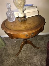 ROUND LEATHER TOP WOODEN TABLE WITH DRAWER