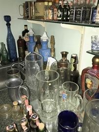 TONS OF COLLECTIBLE JIM BEAM AND LIQUOR BOTTLES