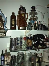 TONS OF COLLECTIBLE JIM BEAM AND LIQUOR BOTTLES