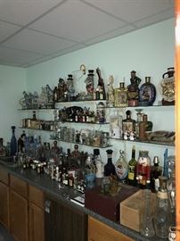 TONS OF COLLECTIBLE JIM BEAM AND LIQUOR BOTTLES