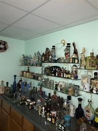 TONS OF COLLECTIBLE JIM BEAM AND LIQUOR BOTTLES