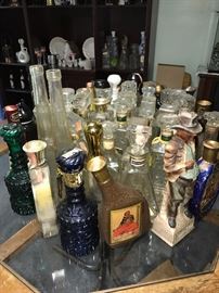 TONS OF COLLECTIBLE JIM BEAM AND LIQUOR BOTTLES