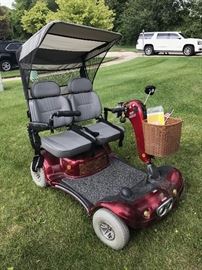 SHOPRIDER MOTORIZED FOUR WHEEL PERSONAL TRAVEL SCOOTER - DOUBLE SEATER- MSRP $5,200