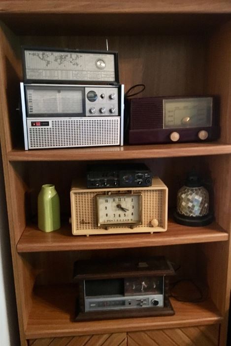 Sharp transistor radio, GE Clock, Marantz professional tape recorder, Sylvania clock, RCA clock.
