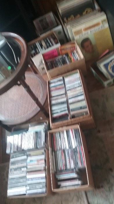 CD's of Rock and other from 1970's to 2000, Records including Nina Simon, Woody Guthrie and others