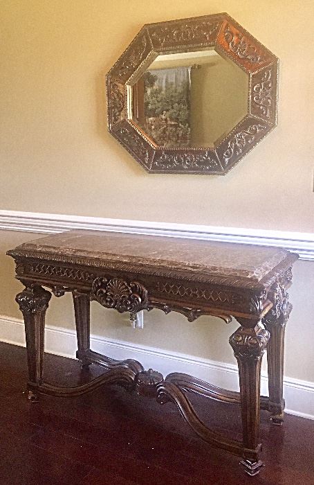 Carved mahogany marble top sofa table, beveled mirror
