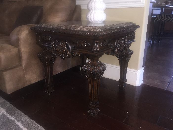 Carved mahogany marble top end table