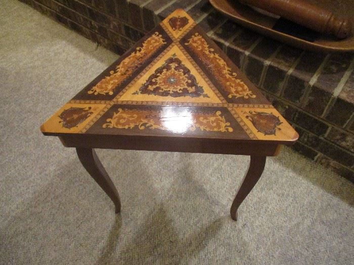 Music box table from Germany.  Part of the Suggested Offer Program.  Ask at check out.