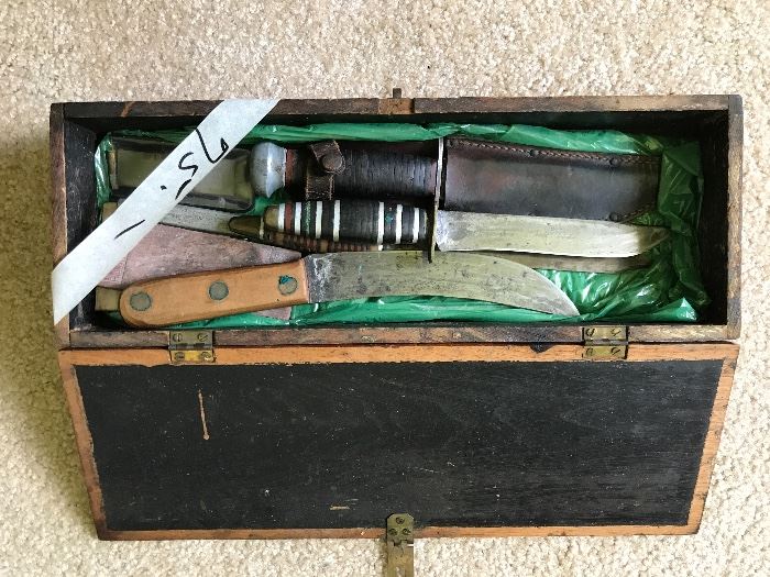 Antique wood box with knives 