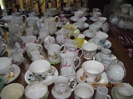 Tea cups and creamers