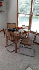 Rattan game table, 4 chrome & wood Breuer-style dining chairs, Panasonic cassette recorders/players, puzzles, playing cards