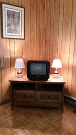 TV stand, small TV (SOLD), 2 small lamps, framed art
