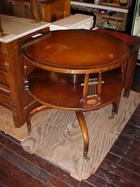 Mahogany leather top drum table.