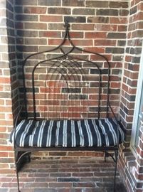 Wrought Iron bench with cushion