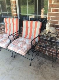 Iron chairs with cushions. Iron table and rabbit for sale too.