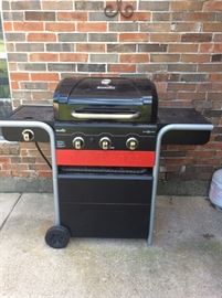 Like new gas grill with cover