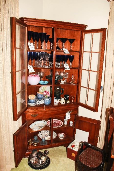 wonderful corner cabinet with beautiful glassware 