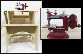 Child's toy sewing machine on stand with bench.