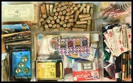 A sampling of the many sewing notions including needles button covers appliques ric-rac and more