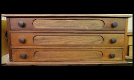 Antique spool cabinet 25 inches wide 17 inches deep 10 and one half inches tall