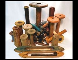 Antique spools , spindles and shuttles
