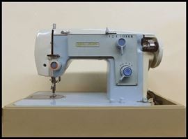 Electric full size sewing machine in baby blue