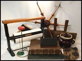 Group of antiques including 1915 History of Wright County book, Bluman Spring Company paper cutter, McCoy pot with lid, wooden wall stamps and wool carders