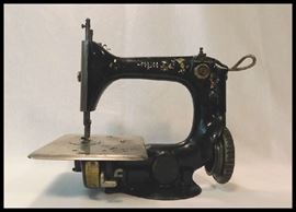 Miniature sewing machine