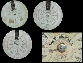 Three antique metal store display cases for needles and shuttles from The Boye Needle Company