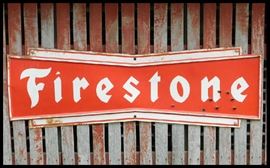Vintage metal Firestone sign approximately six feet wide