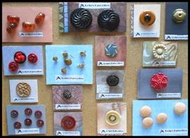 More fascinating buttons including root beer bakelite, carved wood, huge, Post Office, Street Car Conductor buttons and more.