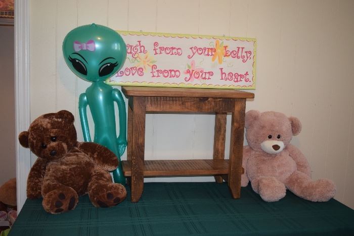 stuffed animals and girl wall sign 