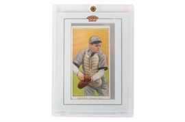 Tom Needham Sweet Caporal Cigarette Baseball game Card: A Tom Needham Sweet Caporal Cigarette baseball card. Topps 206s were released between 1909 and 1911 with an tobacco advertisement on the back. This card features a portrait of Tom Needham (1879-1926) when he was the catcher for the Chicago Cubs. The card is presented and preserved in a hard plastic case.