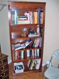 books, and nice cherry color bookcase