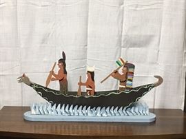 Indian Chief being paddled down the river. Wood and metal with moving parts by deceased Georgia self-taught artist Tubby Brown. 
