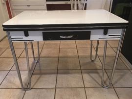 VIntage metal and enamel table in very good condition; has two chairs that need upholstering