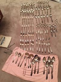 265 pieces of sterling plated silverware and serving pieces