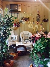 White Wicker with lots of  Decorative Flowers and Baskets