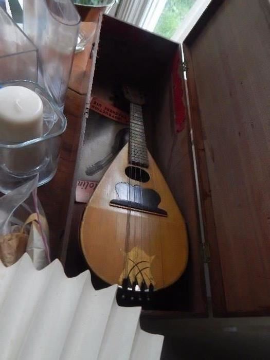 Mandolin. Comes with nice old wooden box.