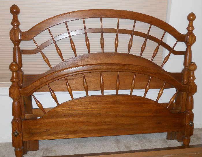 Early American Bedroom Suite.  Solid wood. Set includes head board, foot board, tripple dresser with mirror, tall boy hutch and side table