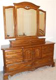 Early American Bedroom Suite. Solid wood. Set includes head board, foot board, tripple dresser with mirror, tall boy hutch and side table
