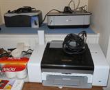 3 computer printers. One with fax