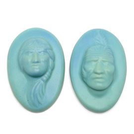 Van Briggle "Indian Head" Man and Woman Plaques: A group of two Van Briggle Pottery “Indian Head” plaques, including a male and a female. They are in a turquoise matte glaze. The backs are marked “Van Briggle Colo Spgs”; and one has artist mark “ALS” while other has artist mark “CB”. CB are initials for Clara Beyers, who made pieces circa 1980. ALS are initials for Arlene Shuckhart, who made pieces circa 1990.