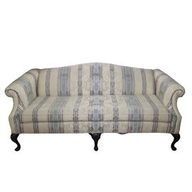 Craftmaster Furniture Sofa: An upholstered sofa made by Craftmaster Furniture of North Carolina. The sofa is upholstered in striped damask fabric and have rolled arms and mahogany stained wood legs. The legs are cabriole in front. The piece has a single loose seat cushion.