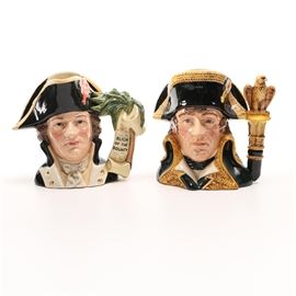 Captain Bligh and Napoleon Royal Doulton Toby Jugs: A pair of Royal Doulton Toby Jugs. Included in this collection is Captain Bligh and Napoleon. Each jug is marked Royal Doulton Made in England on the bottom and includes additional information about the piece.