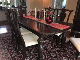Broyhill Contemporary yet traditional expandable dining table. Burgundy oriental below.
