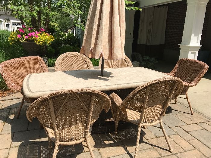 Heavy Frontgate outdoor rectangular table with chairs and umbrella